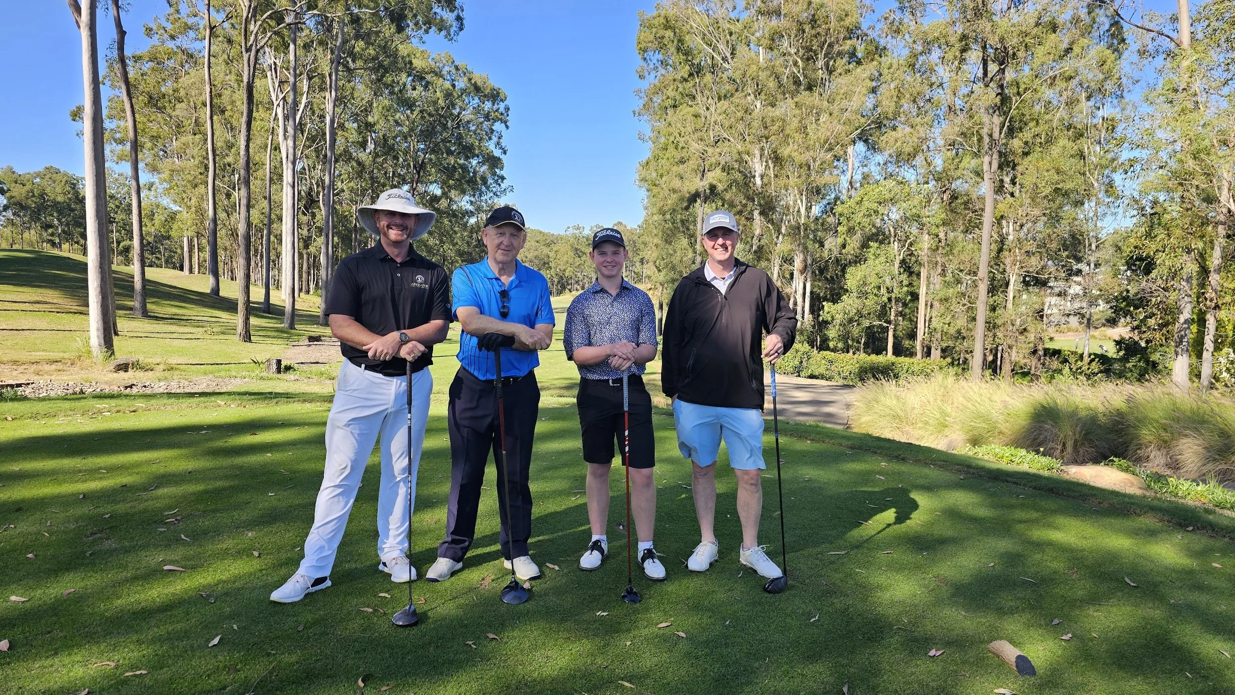 PGA Professional Paul Williamson teaching on-course golf strategy during a Play With The Pro Experience at Emerald Lakes Golf Coaching Centre on the Gold Coast.