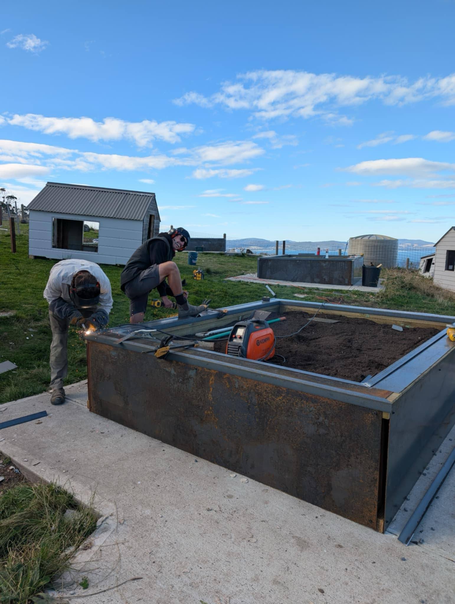 In Bloom Landscaping installing veggie boxes