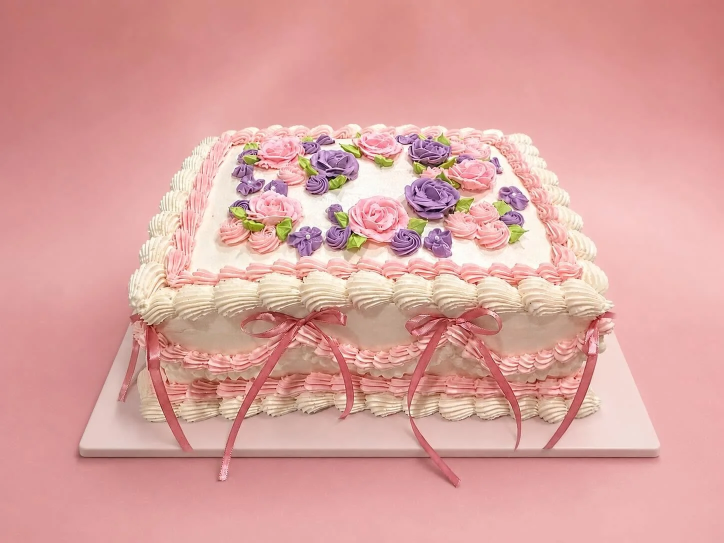 sheet cake with flowers and vintage decoration