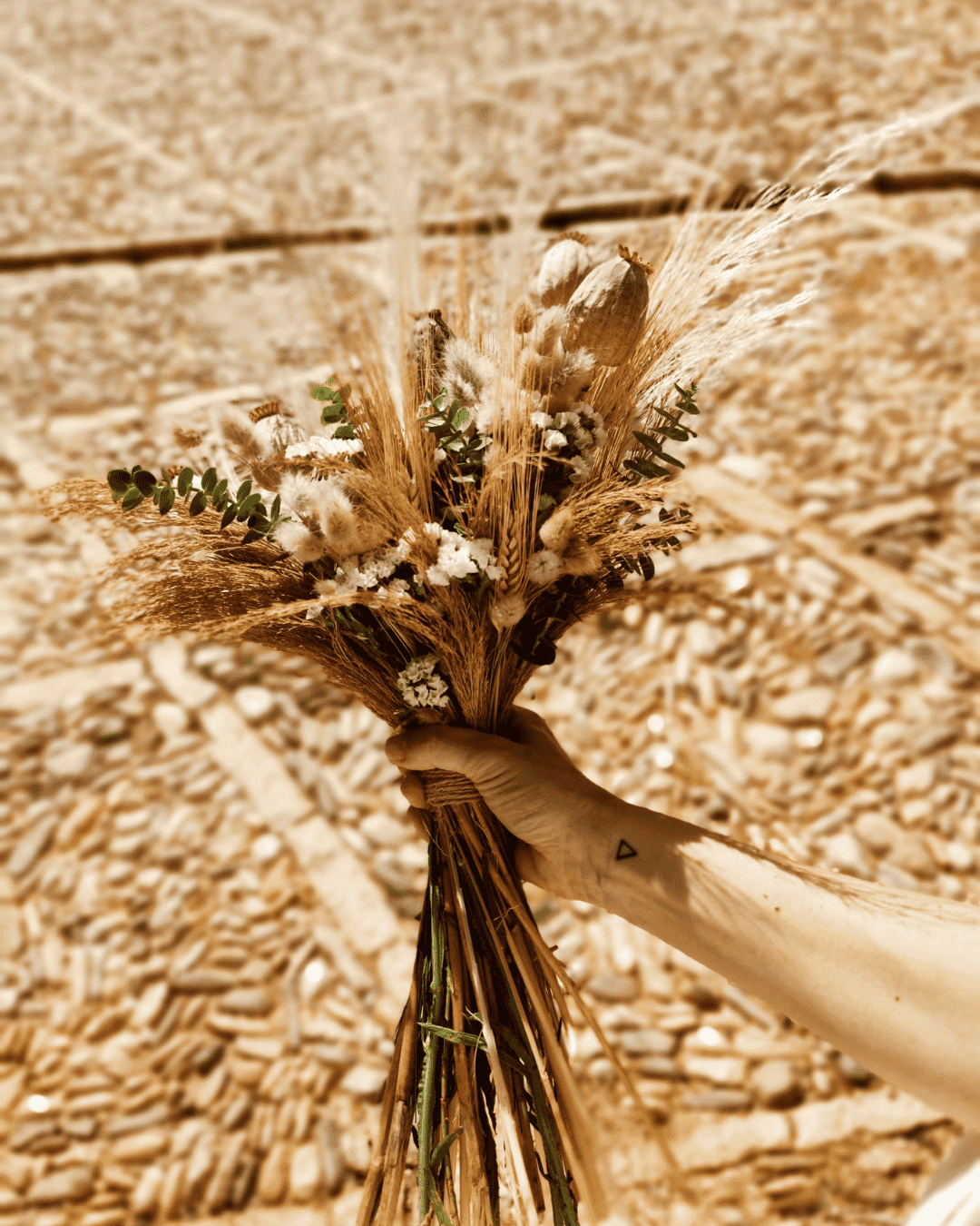 Rustic Sicily wedding bouquet with dried flowers and earthy Mediterranean bridal styling