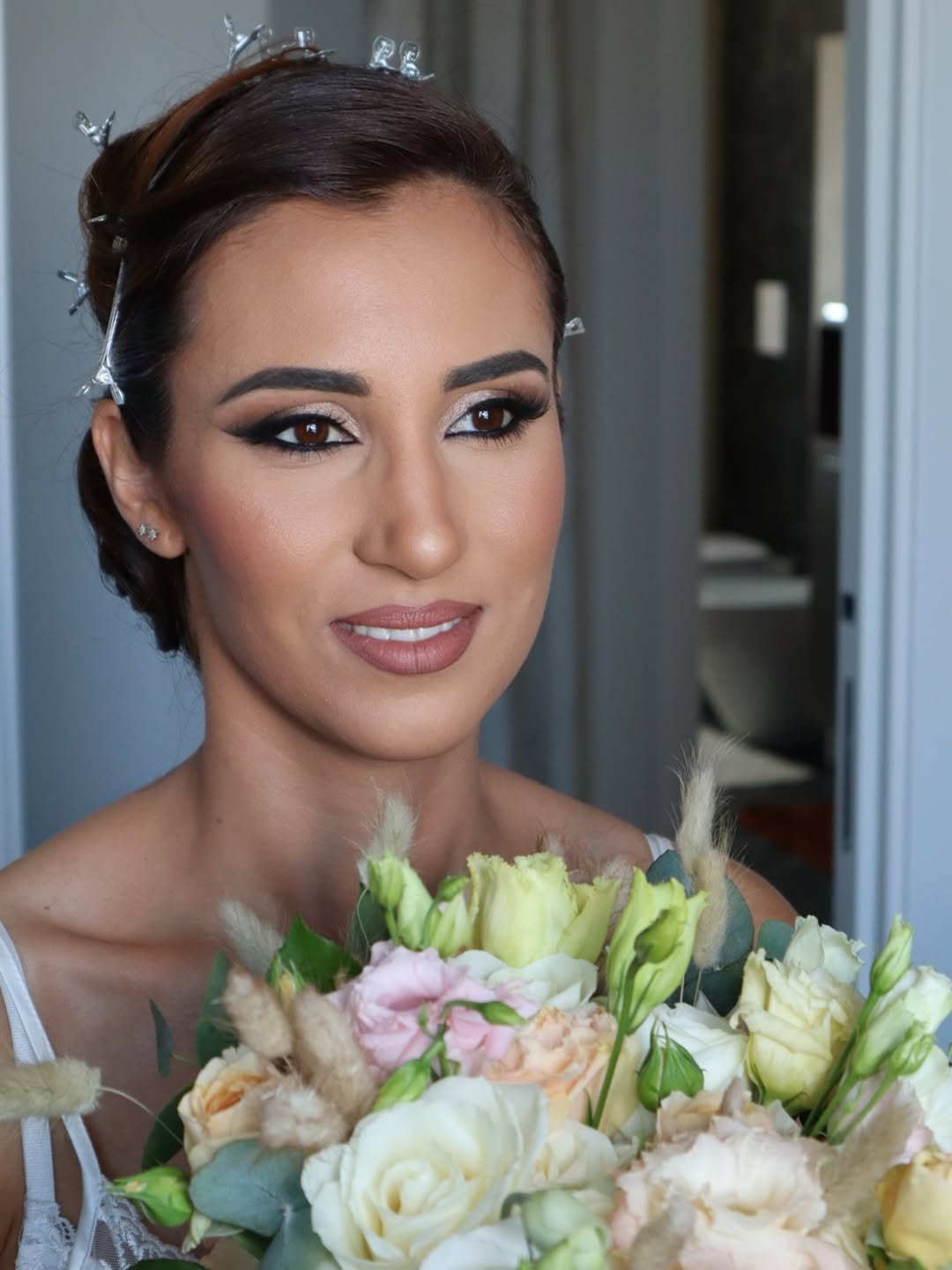 Close-up portrait of a bride showcasing elegant and timeless bridal makeup by Sonia Cuddemi in Sicily