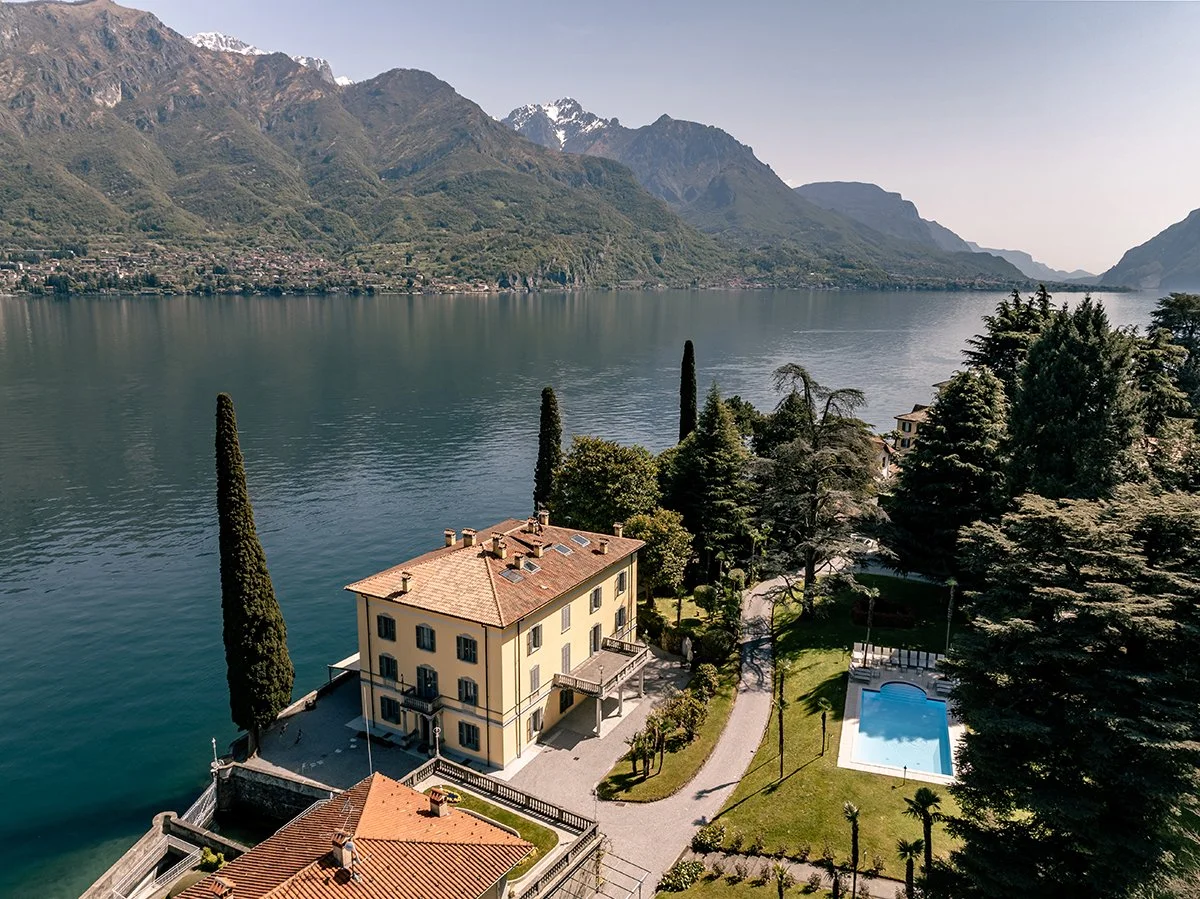 Elegant lakeside wedding villa overlooking Lake Como, Italy, with mountain views, manicured gardens, and a swimming pool, ideal for a luxury destination wedding or elopement.