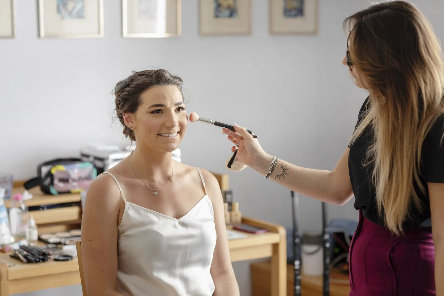Bride receiving final makeup touches for a natural and timeless Sicily wedding look
