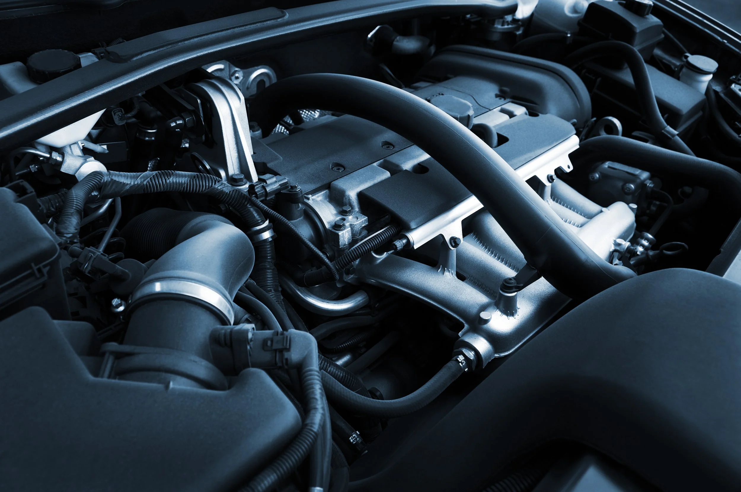 Professional engine bay cleaning and detailing during mobile car detailing service in Fremont NE