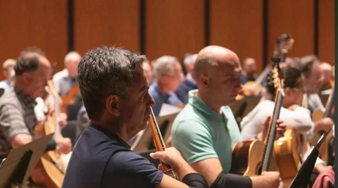 Rehearsal Session- Part of a 60 Classical Guitarist Orchestra Playing  Concerto in D minor 1st and 2nd movements by Alessandro Marcello (Arr. J. Agostino) with Jacques Lee Wood as Cello Soloist (2019).