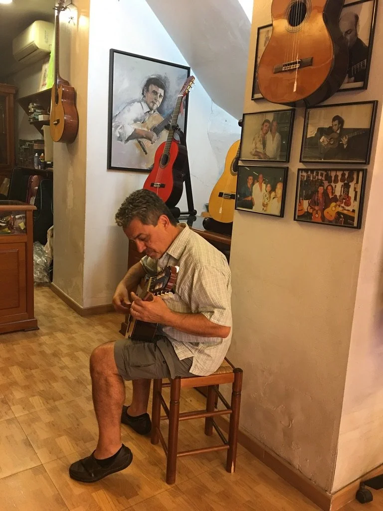 In Sevilla, Spain for inspiration and trying out few guitars at a local guitar shop (2019).