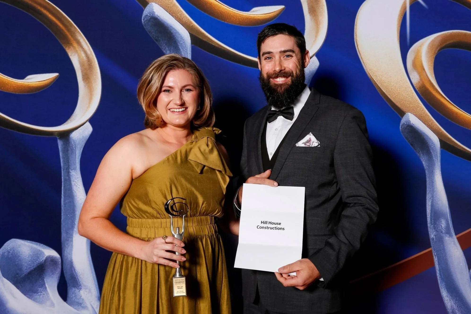 James and Courtney Hill from Hill House Design & Construct receiving their national award at the Australian Trades Small Business Champion Awards.