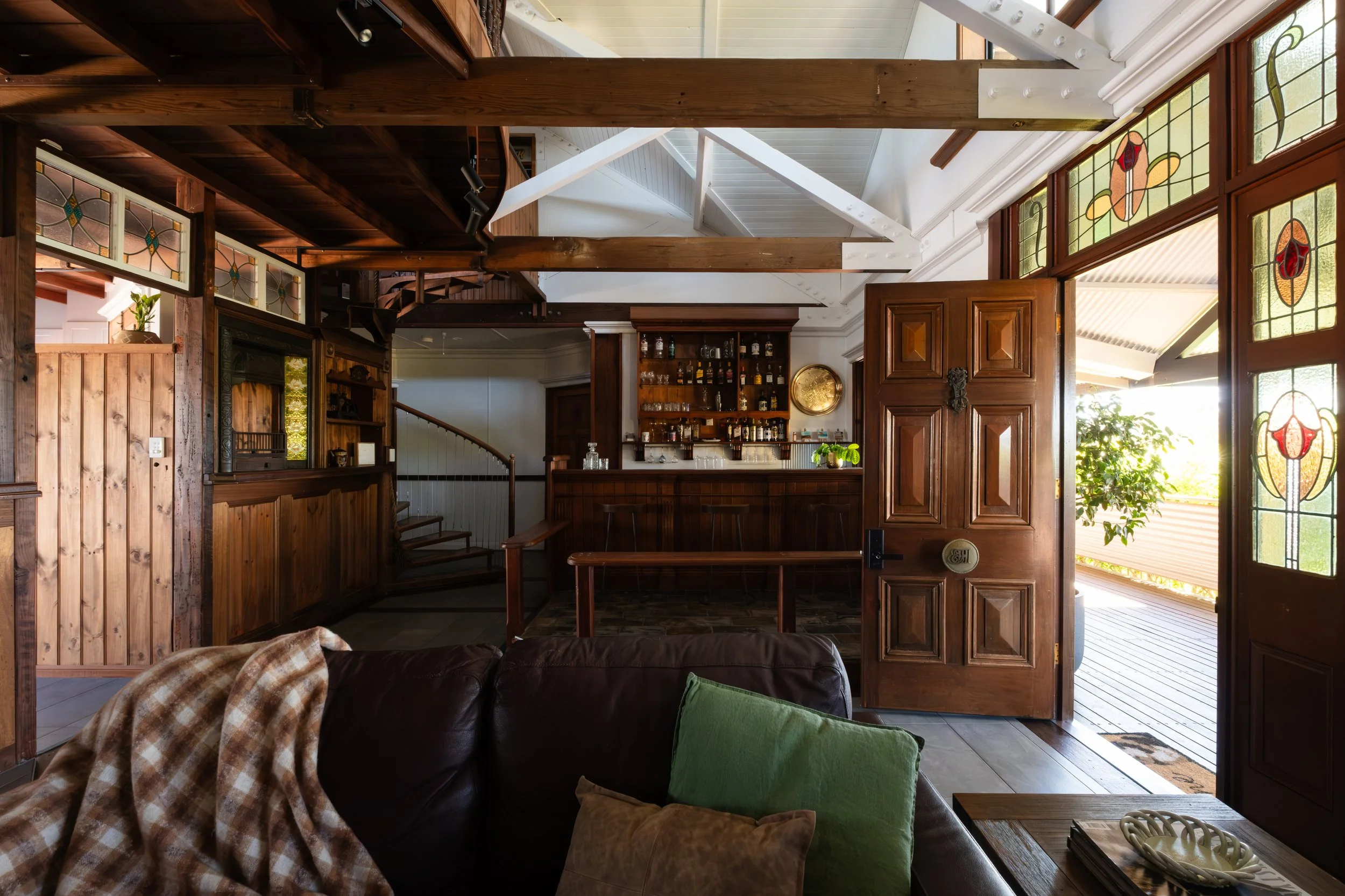 Cosy character home interior with timber panelling and stained glass, renovated by Hill House Design & Construct.
