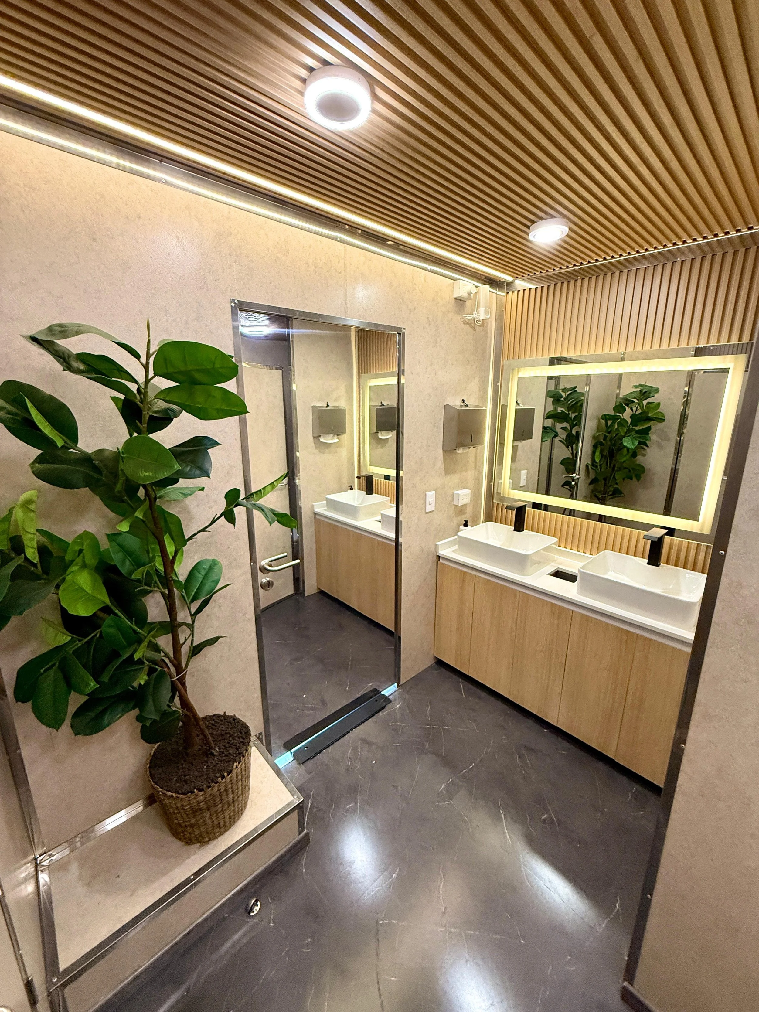 gorgeous interior of a luxury bathroom trailer rental in Austin, TX