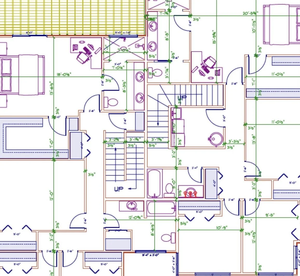 Architectural floor plan of a house showing detailed measurements and room layouts, including bedrooms, bathrooms, staircases, and other living spaces.