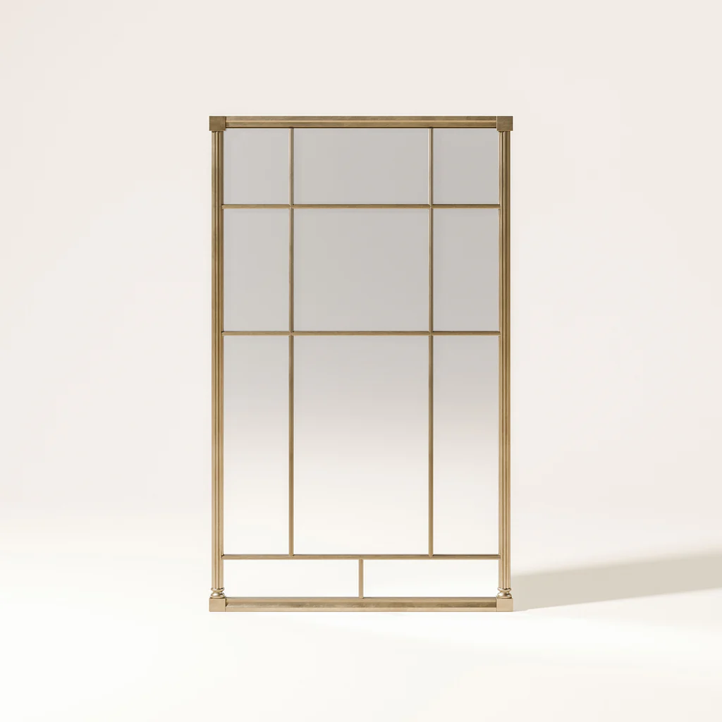 Gold-framed mirror with grid design on a plain white background.