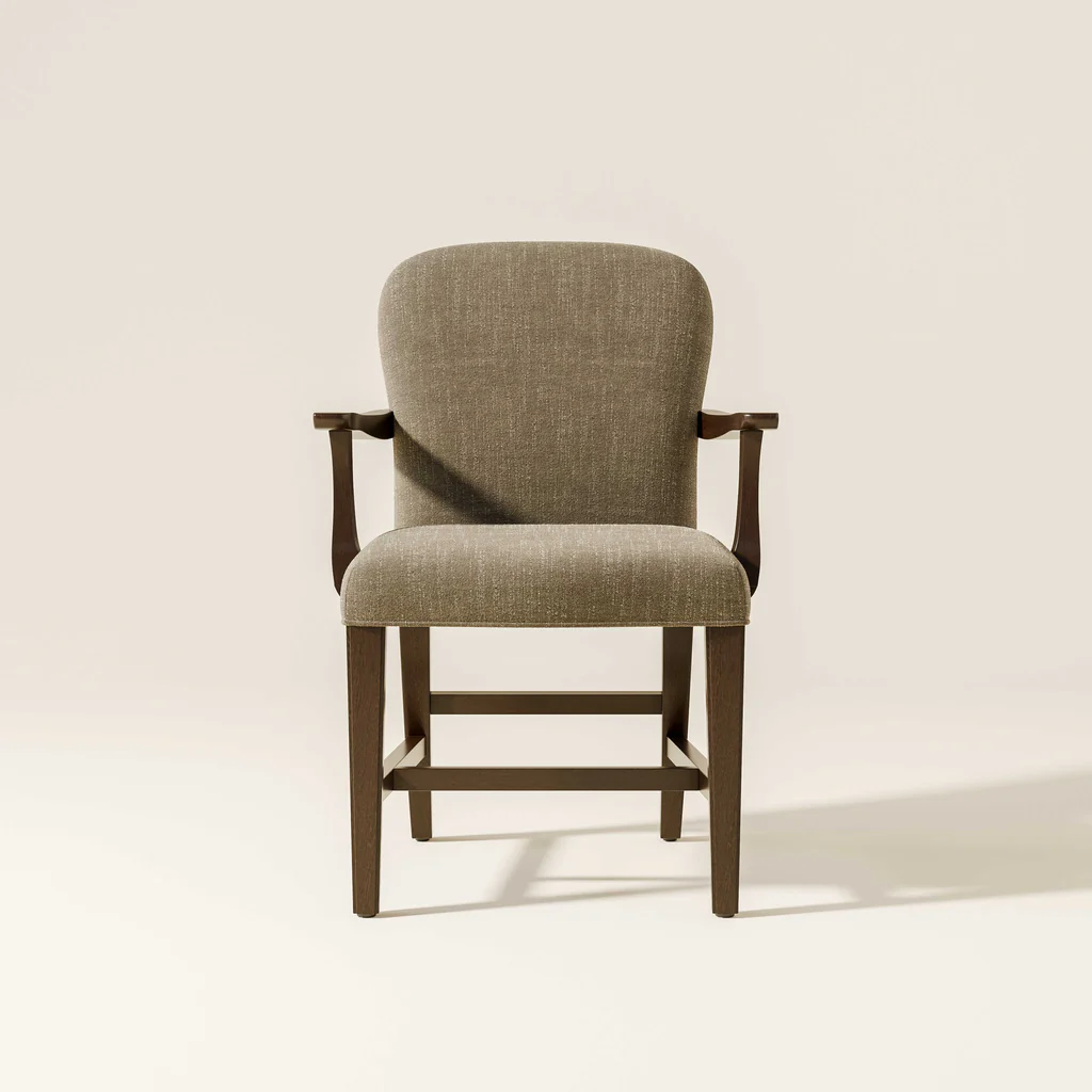 A single upholstered armchair with a cushioned seat and backrest, with wooden arms and legs, placed against a plain light background.