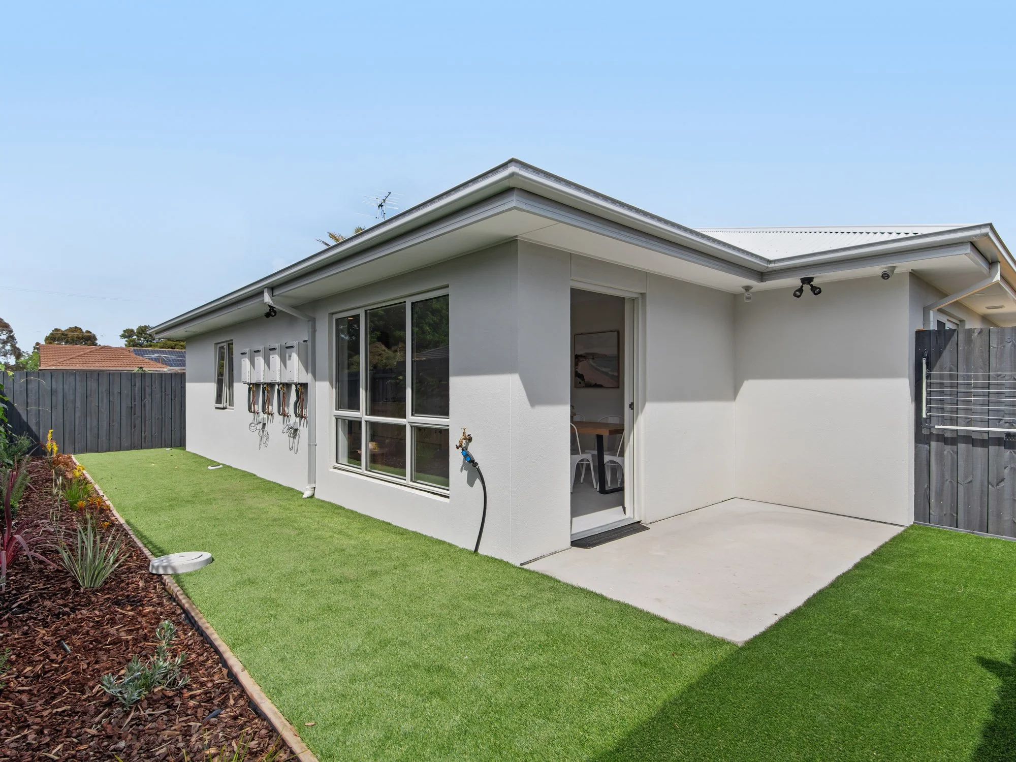 landscaped backyard in a rooming house