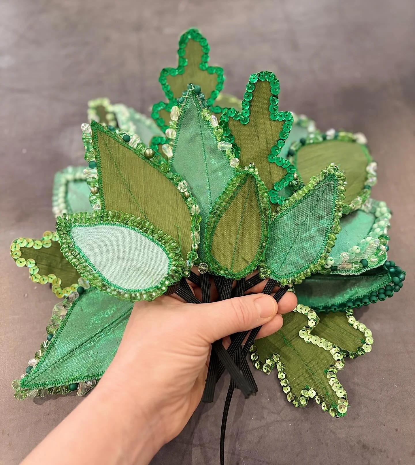 For days now I&rsquo;ve had leaves delivered through the post and now I&rsquo;ve got a beautiful bunch of stitched leaves. All created with the wonderful Steps to the Future group after an online workshop.
Time to get the headdresses ready for illumi