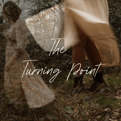 A person walking through a forest with trees and fallen leaves, with overlaid text 'The Turning Point'.
