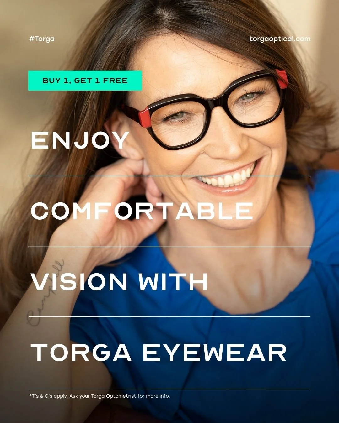 Close-up photo of DESIRE Campbell from AURA Models with glasses smiling. Text on image promoting Torga Eyewear with a buy one get one free offer.