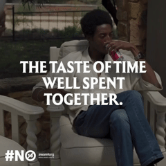 ONA Constantin and KUNDAI Madhandara from AURA Models sitting on outdoor furniture, drinking from a red cup, with a background of trees and a building, and overlaid text that says 'THE TASTE OF TIME WELL SPENT TOGETHER.'