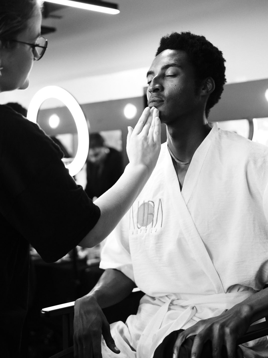 KUNDAI Madhandara wearing his AURA Models gown