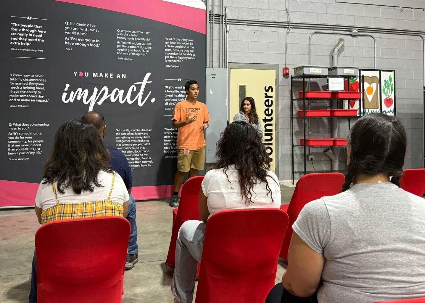 Austin Saman and Kir Evancho, Volunteer Supervisor and Senior Giving Officer for the Central Pennsylvania Food Bank, shared with the Pack-a-Thon volunteers the depth of their impact.