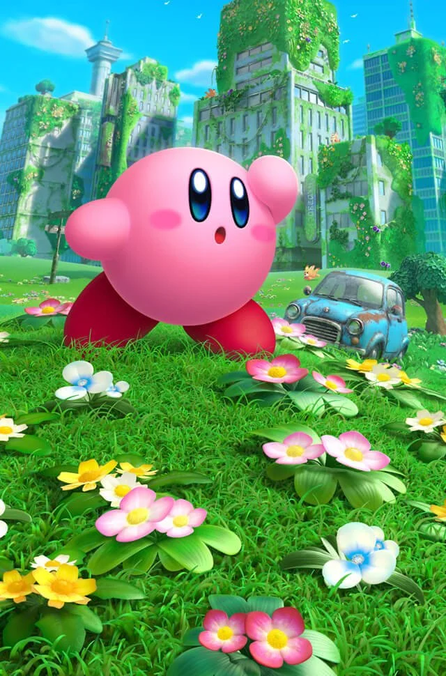 Pink, round character with big eyes and small arms, sitting on grass surrounded by colorful flowers, in front of green, vine-covered buildings and a rusty car.