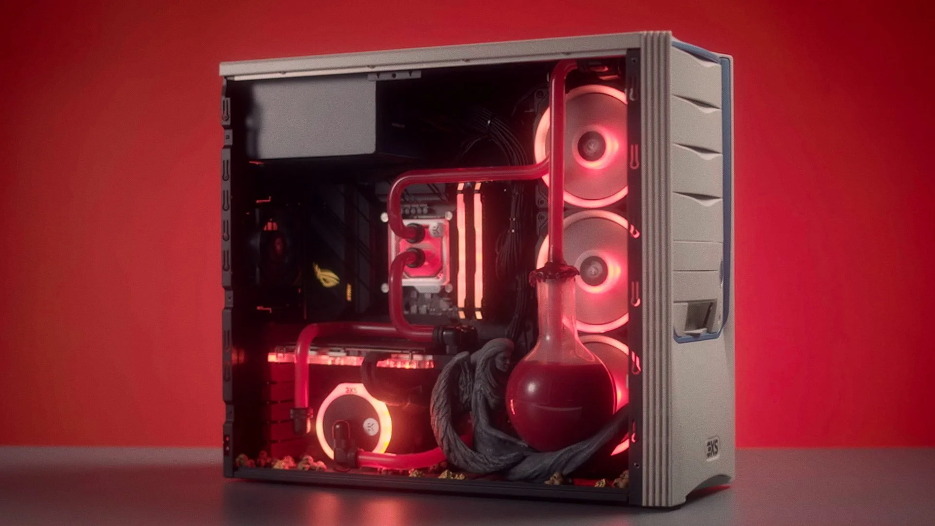A custom-built gaming computer with water cooling, illuminated with red LED lights, housed in a silver case with a transparent side panel.