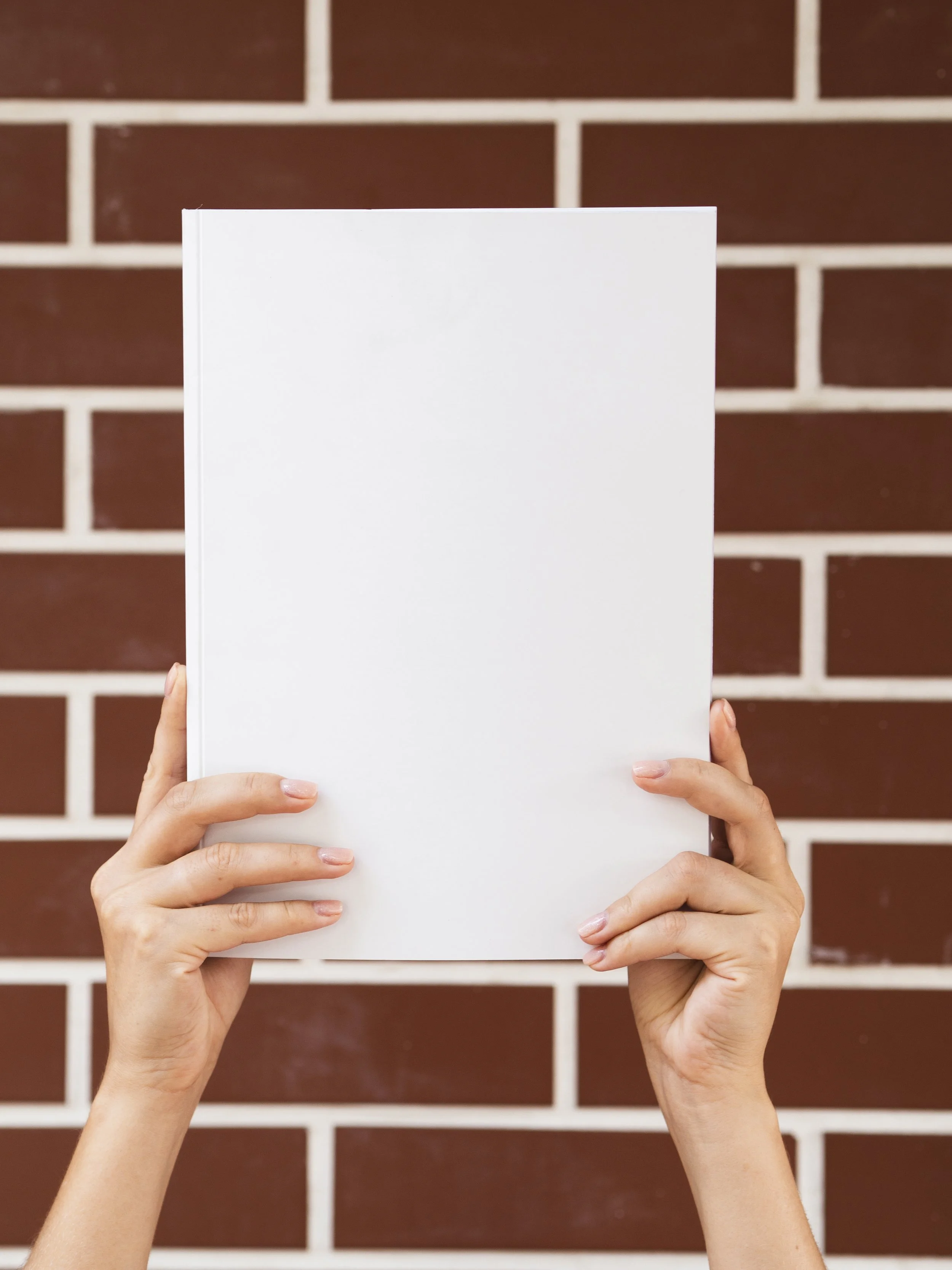 mock-up-magazine-held-by-woman.jpg