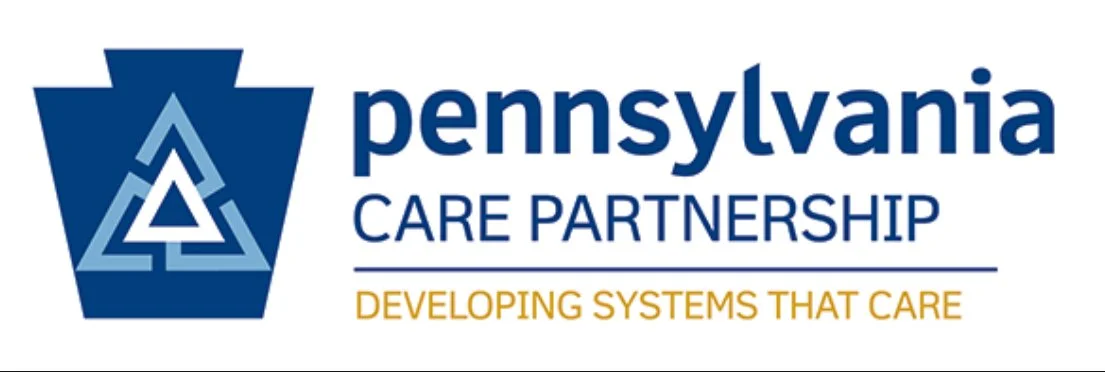 Logo of Pennsylvania Care Partnership with a blue emblem and the slogan "Developing Systems That Care"