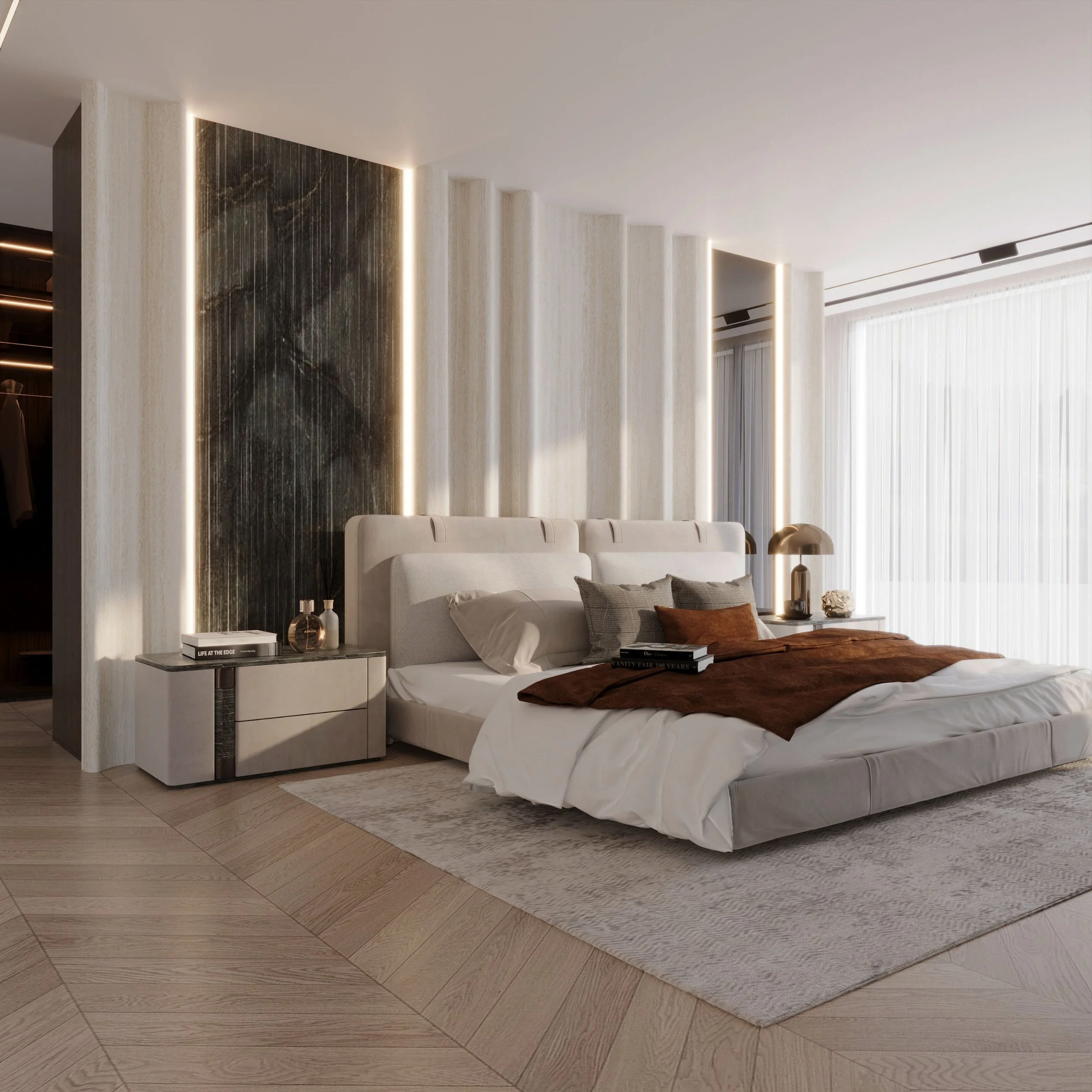 Modern bedroom with a large bed, beige headboard, and assorted pillows, nightstands with decorative items, a textured wall with LED lighting, and sheer curtains letting in natural light.