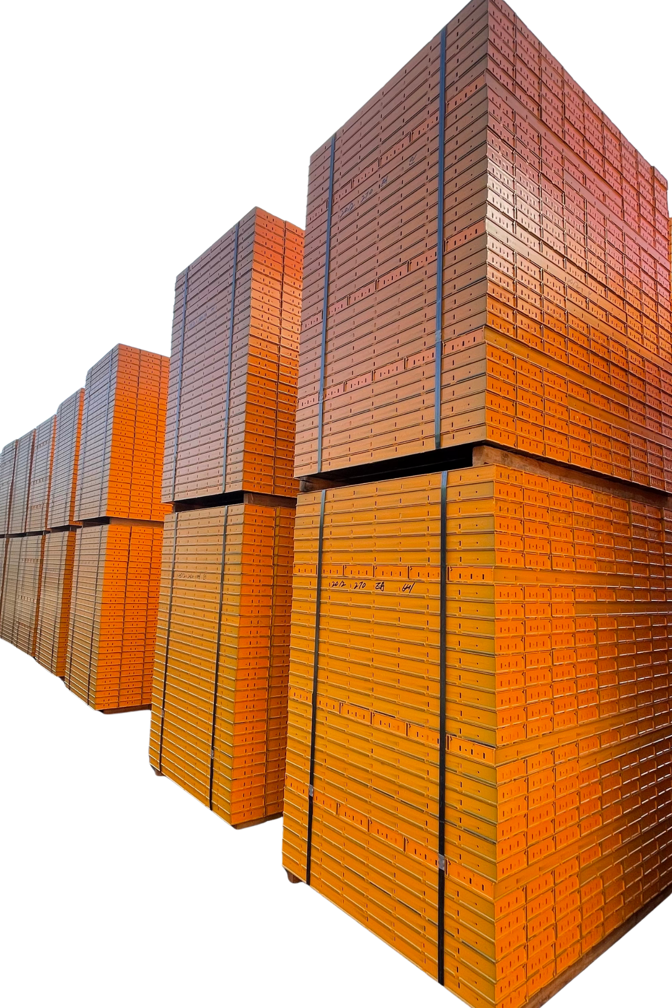 Stacks of orange bricks arranged in tall rectangular formations against a black background.
