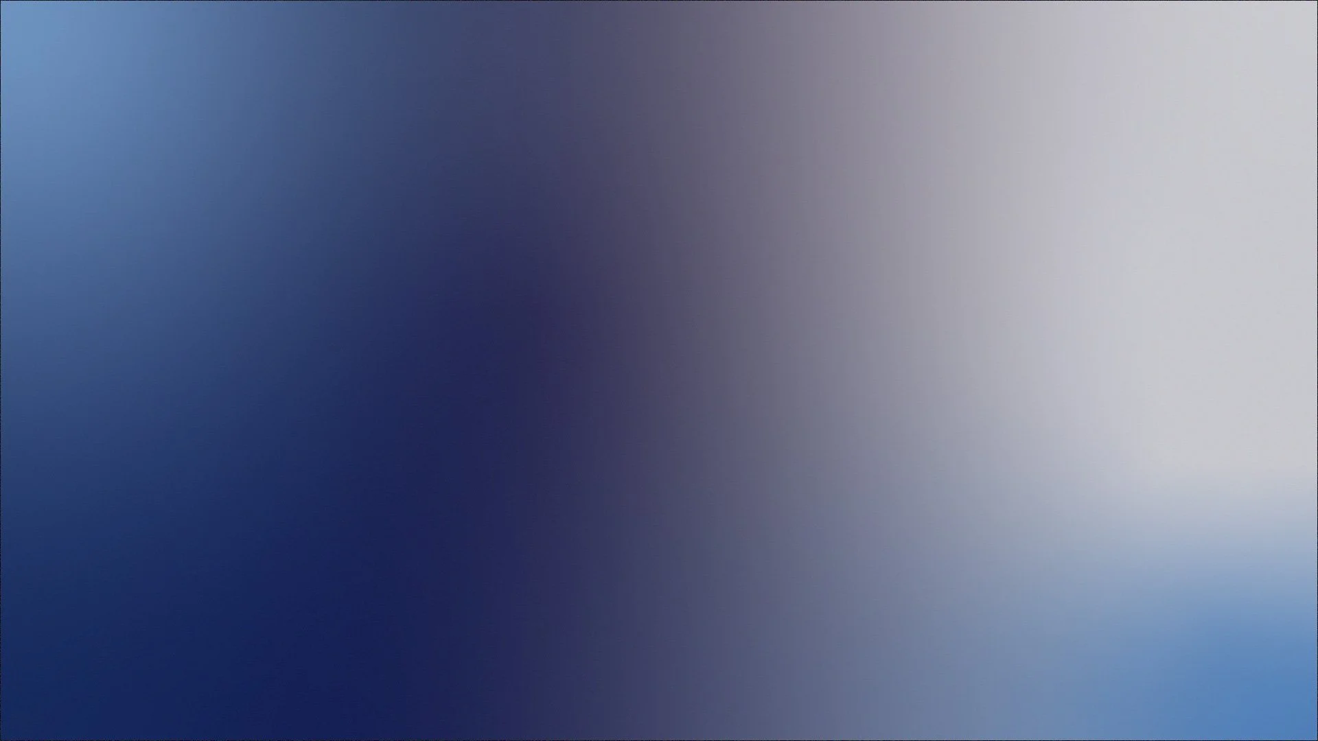 Blurred gradient background with shades of blue, purple, and white.