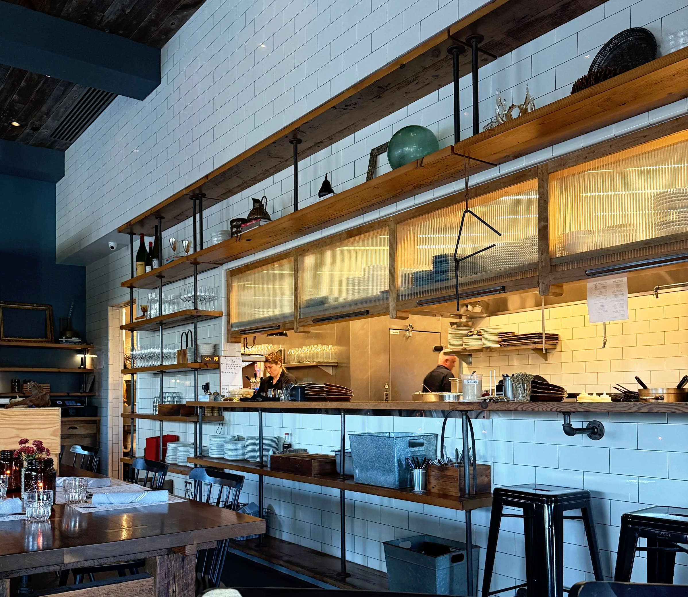 A side view of the space and kitchen at Kindred Fare in Geneva, New York.