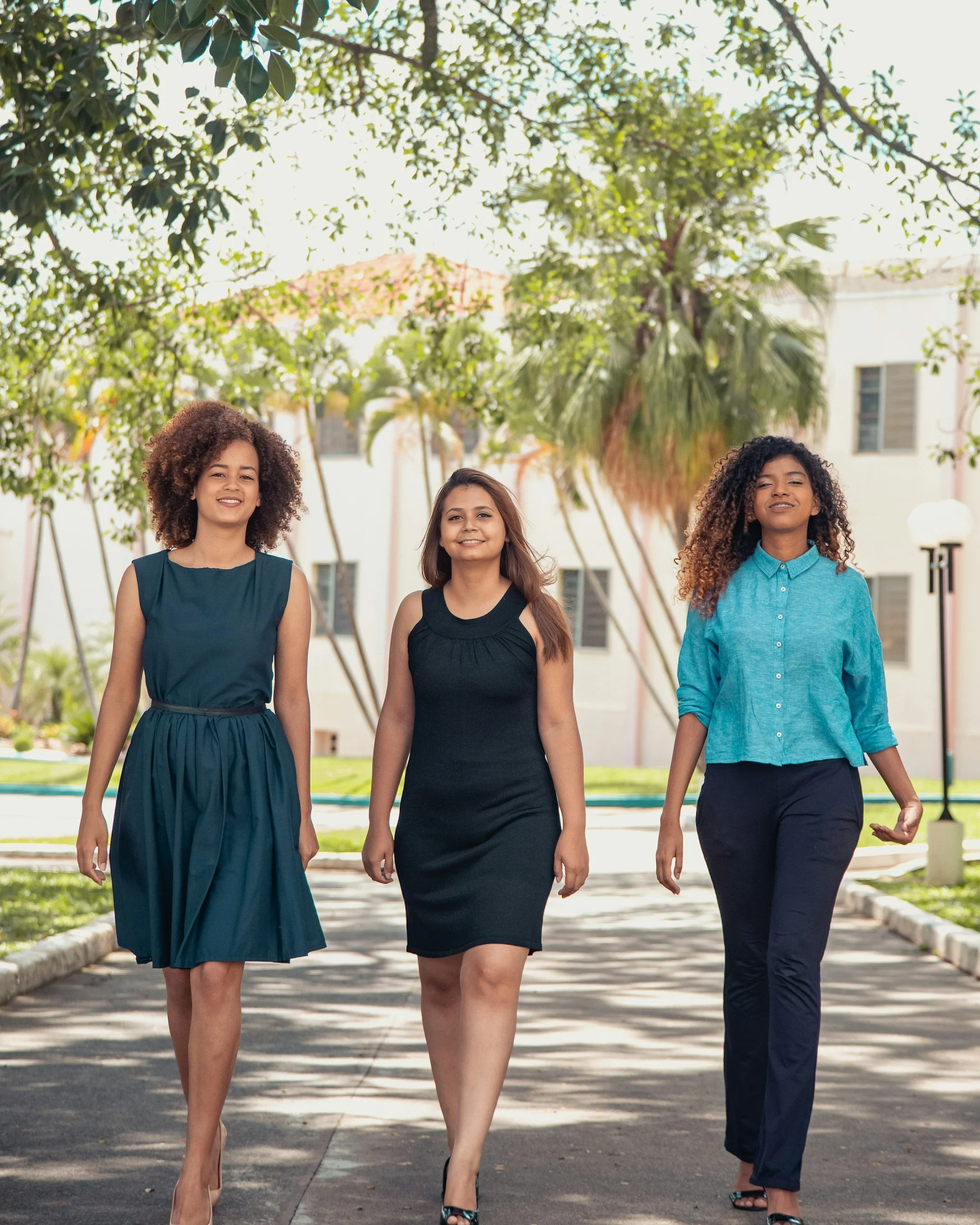 A group of teens smiling after anxiety therapy.