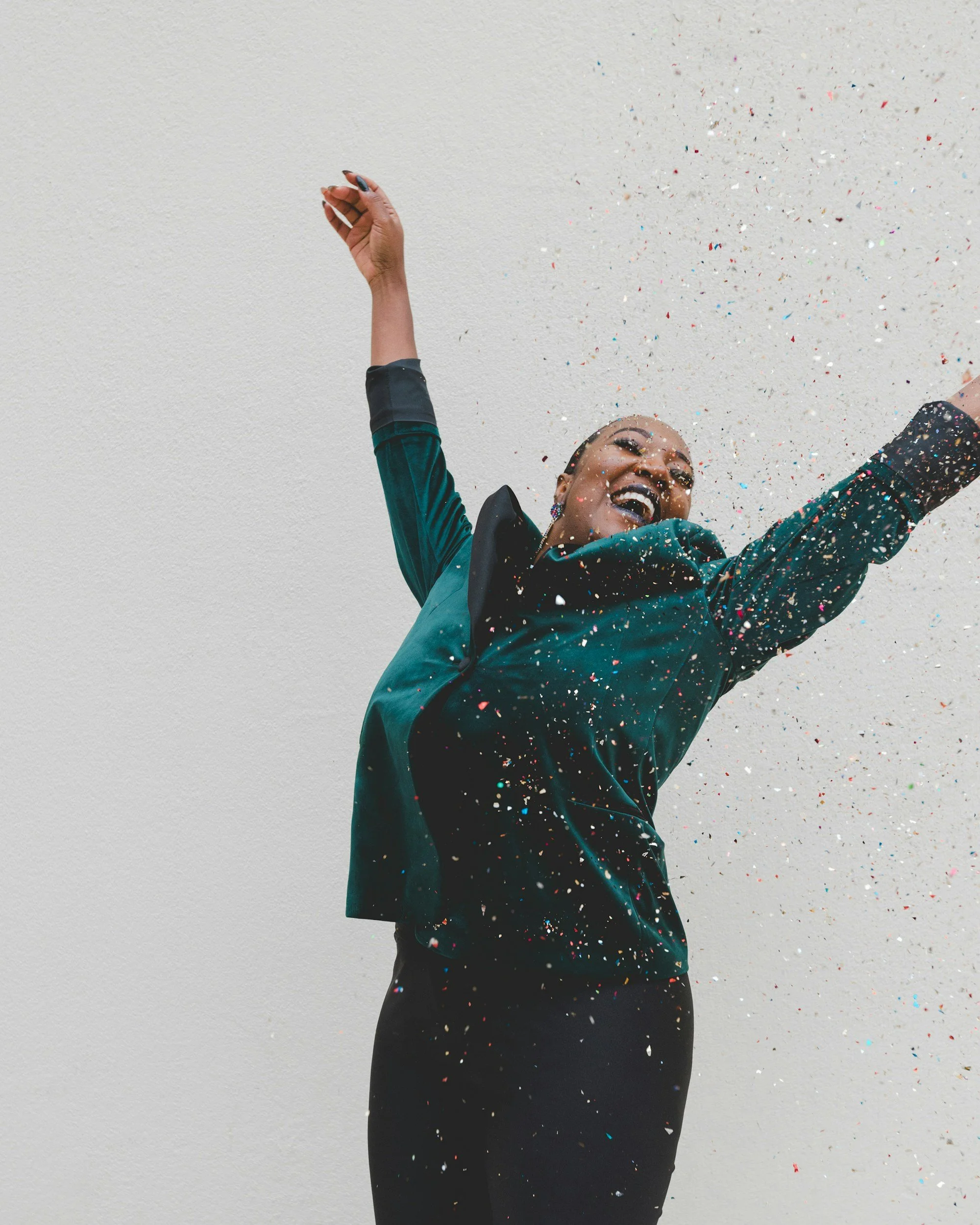 A joyful client after therapy jumping for joy