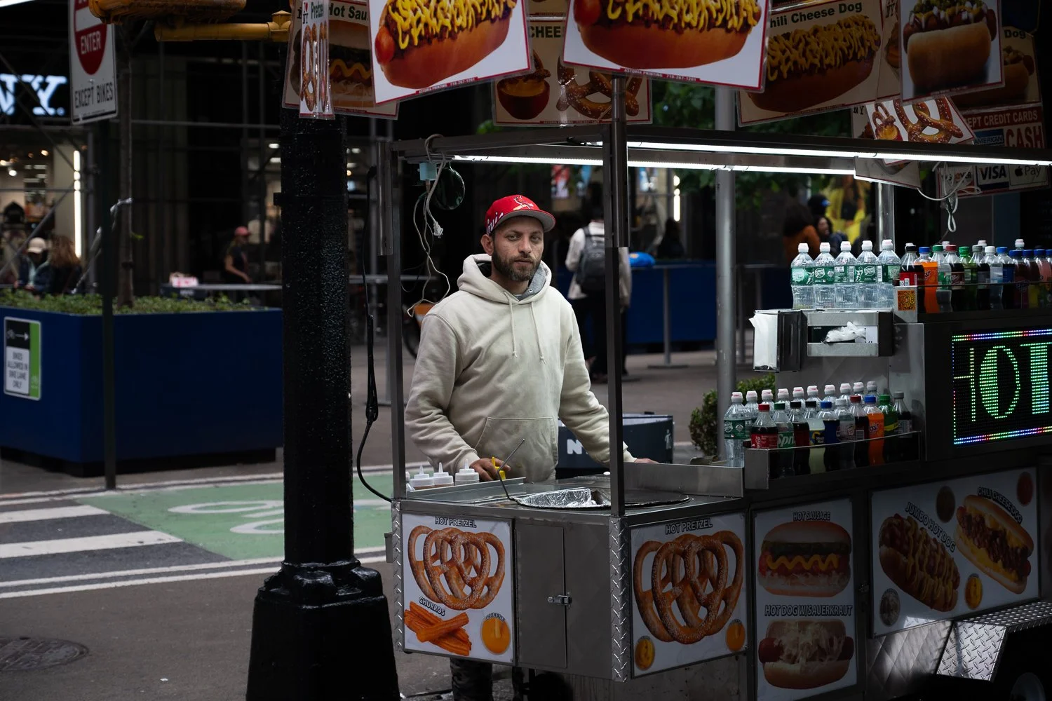 A man operates a food stall in midtown Manhattan on June 1, 2025.