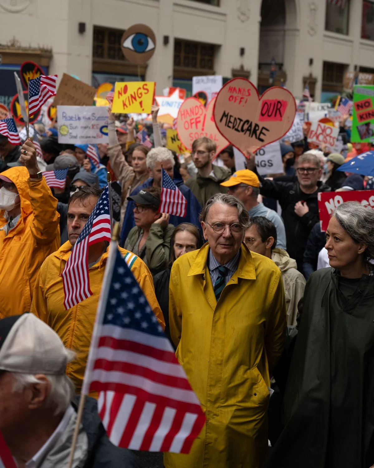 Demonstrators march through the rain during NYC's "No Kings" protest, as a part of a nationally coordinated day of action, on June 14, 2025.