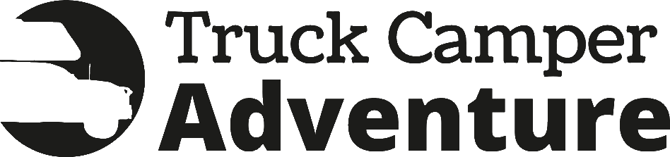 Logo for Truck Camper Adventure featuring a stylized truck camper icon.