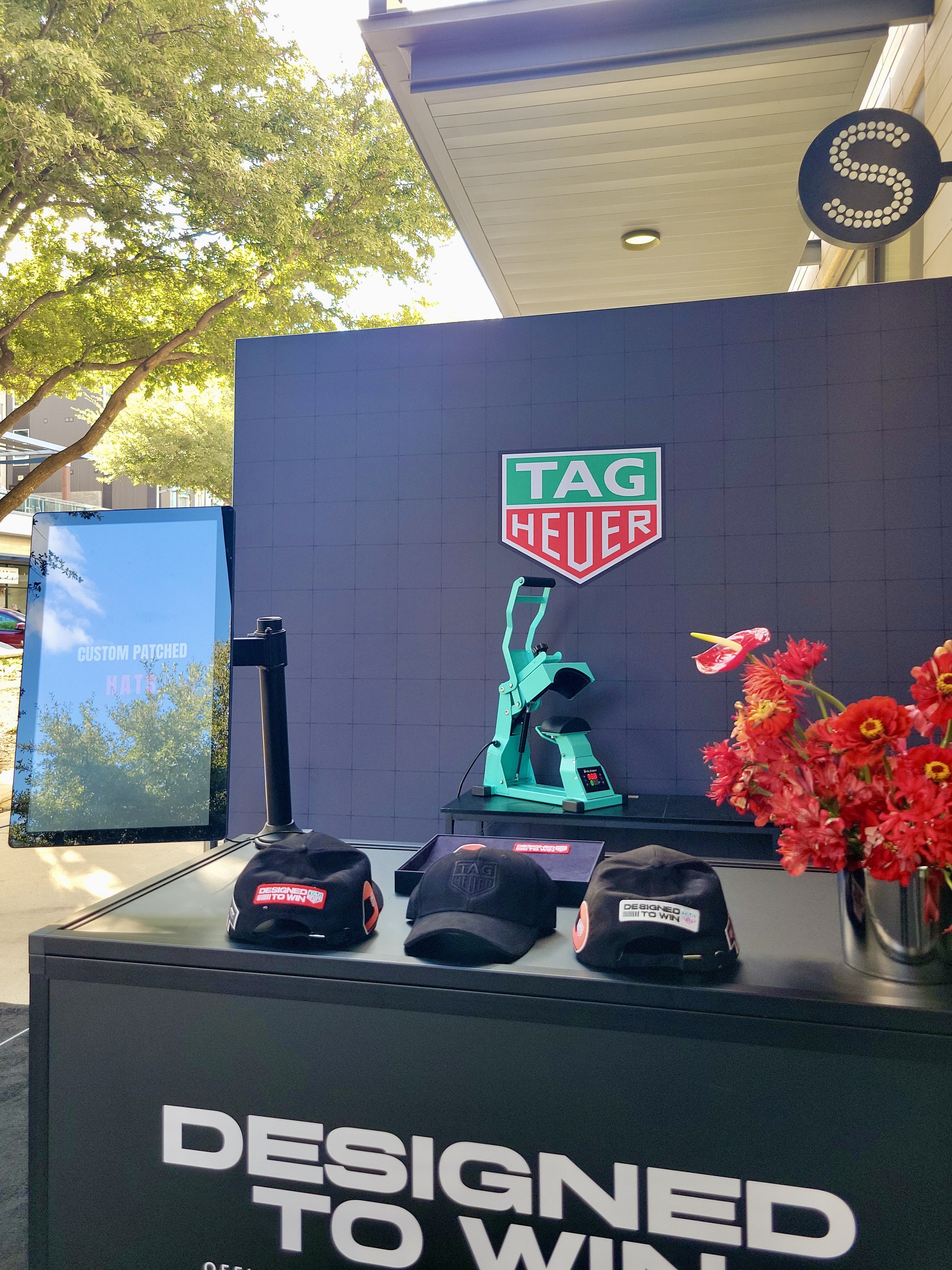 Live heat press service enabling efficient personalization for high-volume brand activations.