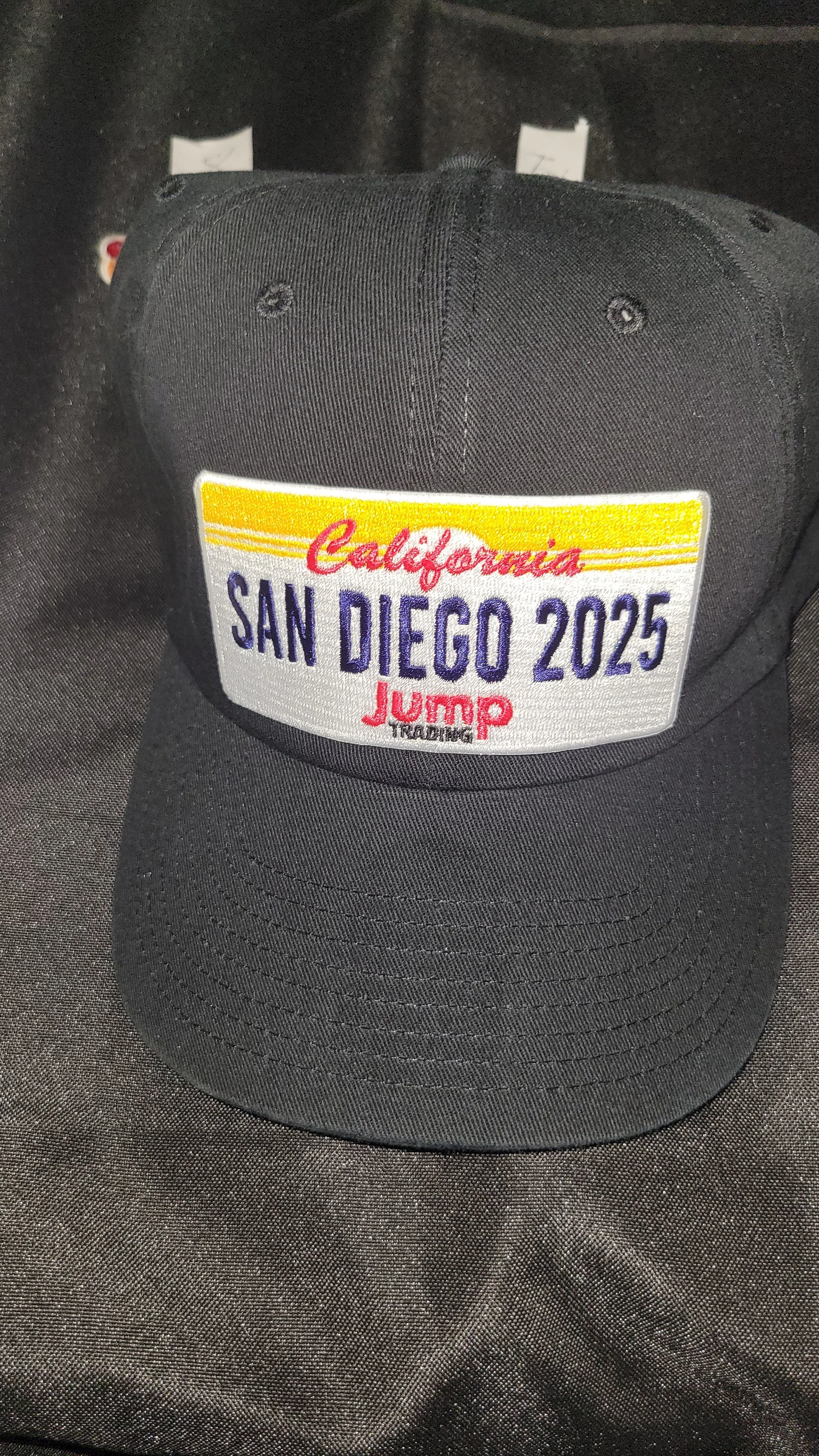 Live heat press service enabling efficient personalization for high-volume brand activations.