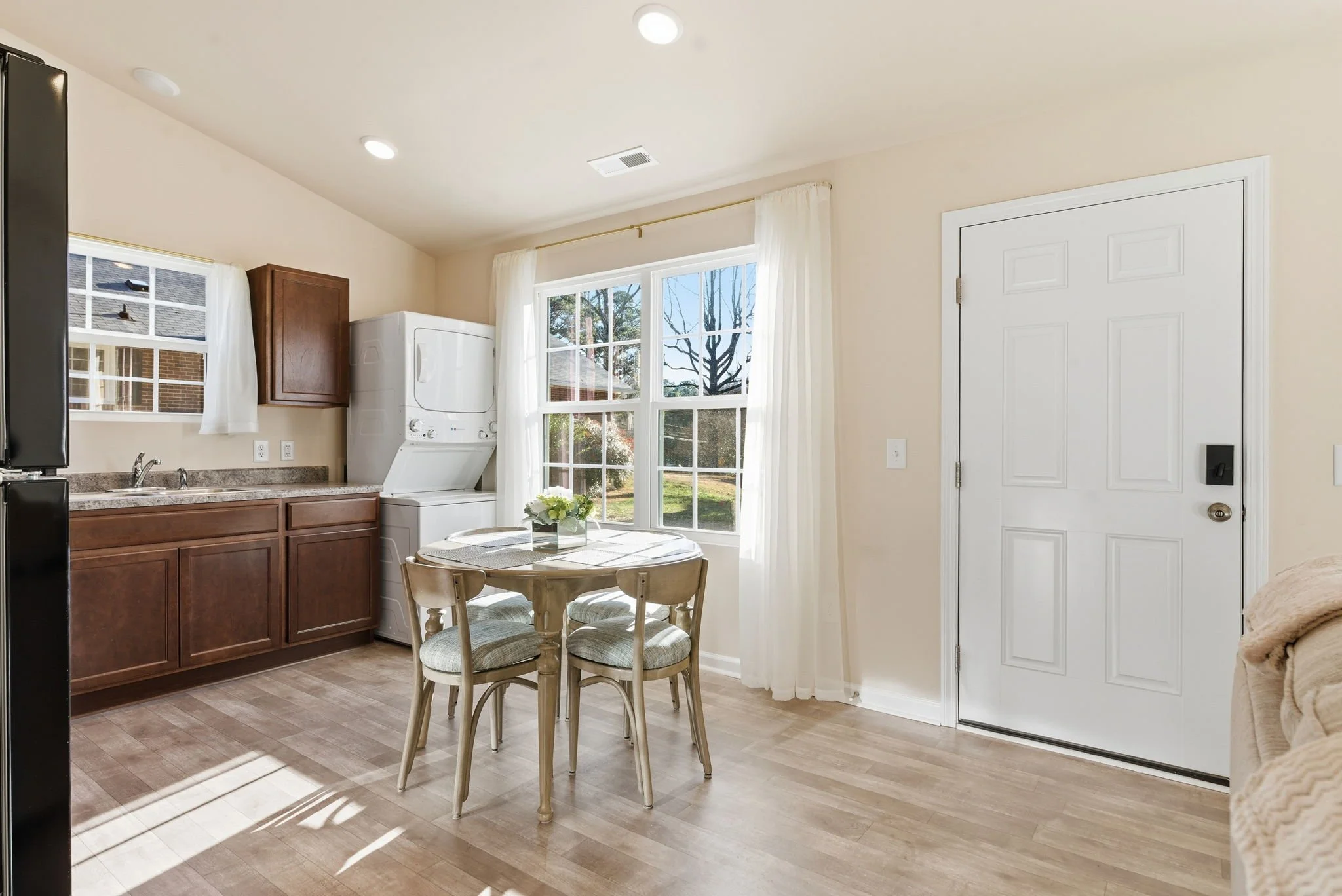 Welcoming entryway featuring a secure smart lock for 24/7 self-check-in. This modern home offers privacy and comfort just minutes from Duke University, Duke hospital, and downtown Durham.