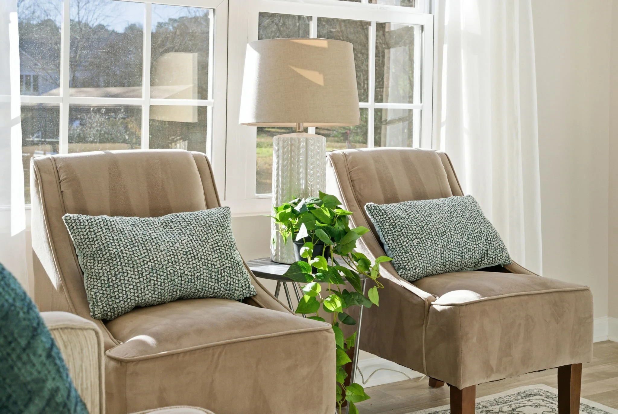 A cozy extended stay rental in Durham, NC. Located near Cole Mill Rd, this living room offers high-speed Wi-Fi (AT&T fiber) and comfortable seating for remote workers or traveling nurses.