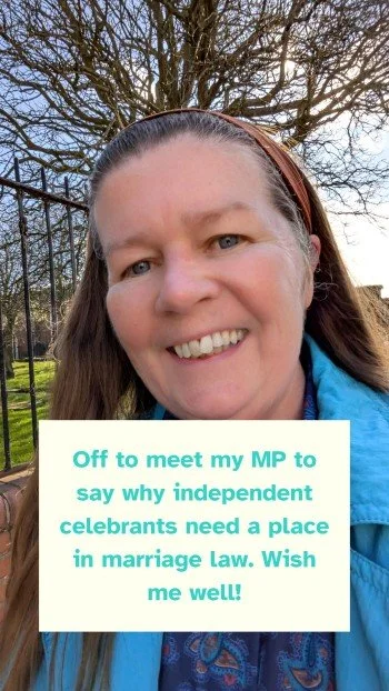 This outside image is a close up of Kate's face with trees in the background. Text is overlayed, that was used in social media saying "off to meet my MP to say why independent celebrants need a place in marriage law. Wish me well!"