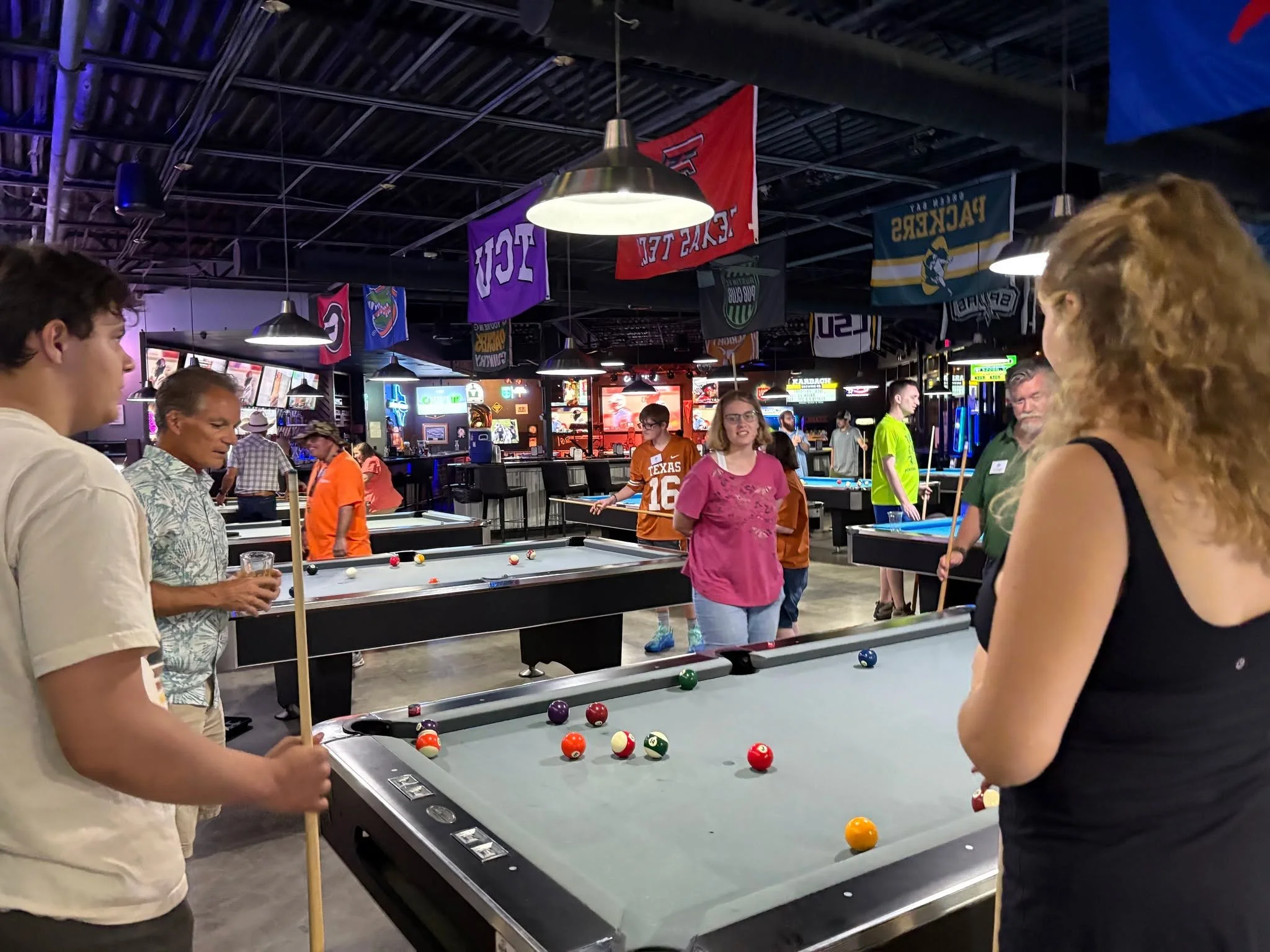 AIMers had an awesome Saturday night out at Shooters Billiards in North Austin!  They spent the evening playing pool, enjoying great food, and hanging out with friends. A huge thank you to the amazing Shooters staff for making sure everyone had a fan