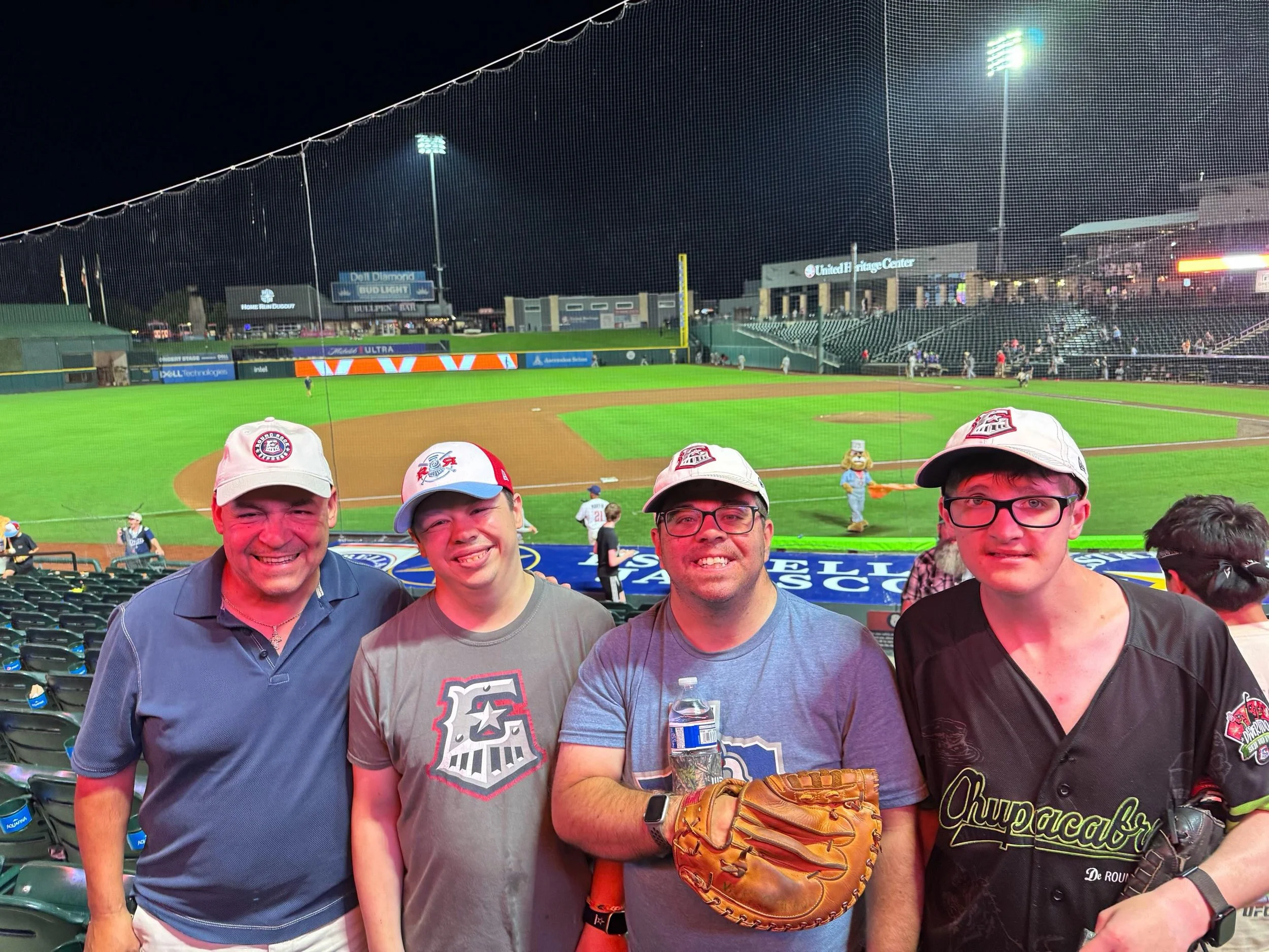 Wednesday night at the Round Rock Express game, a few AIMers had the pleasure of running into Lucio Calzada, who generously donated Dallas Cowboys preseason tickets to AIM's auction last year.
We're so grateful for supporters like Lucio who help make
