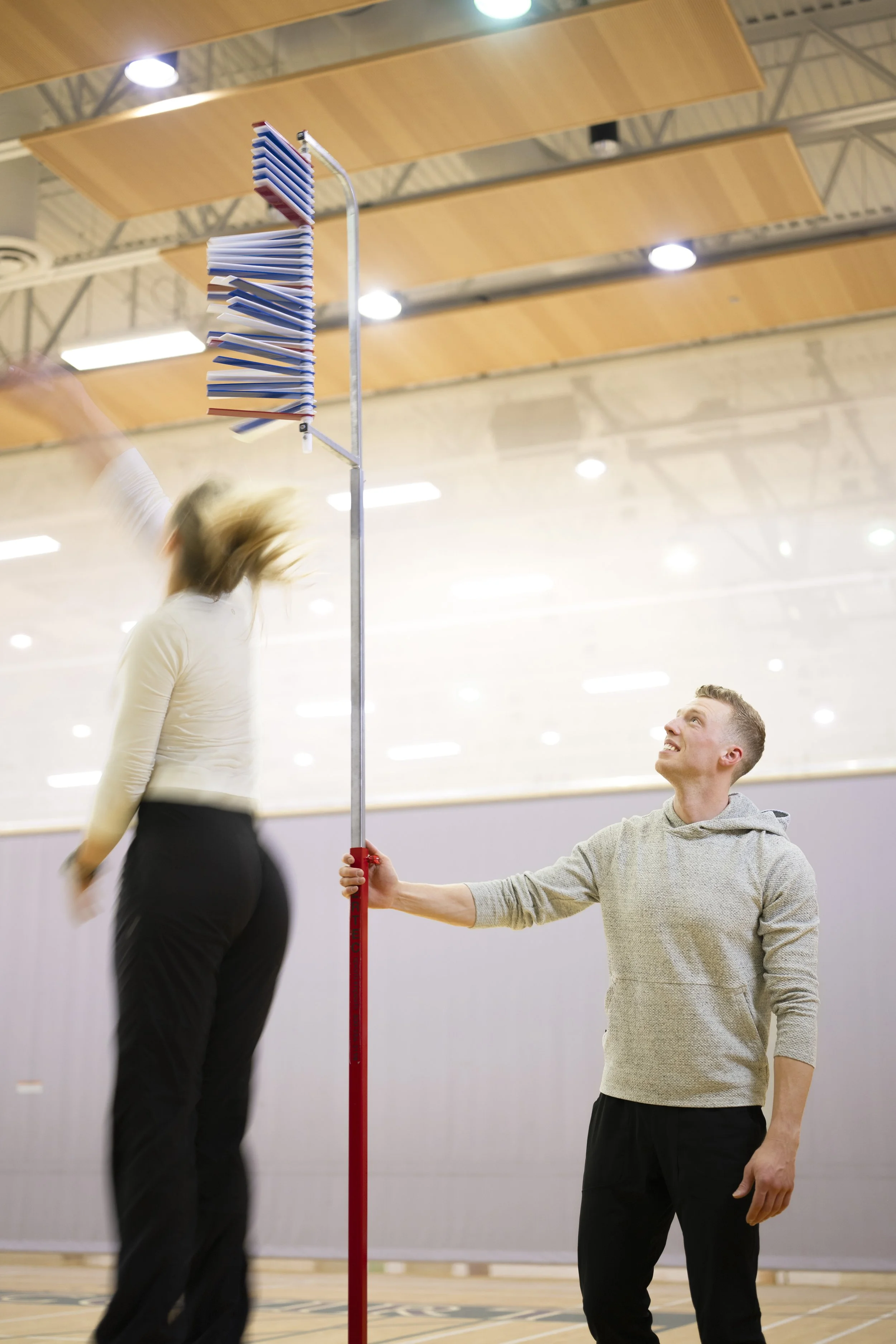 Vertec device being used to measure a volleyball athletes approach jump.