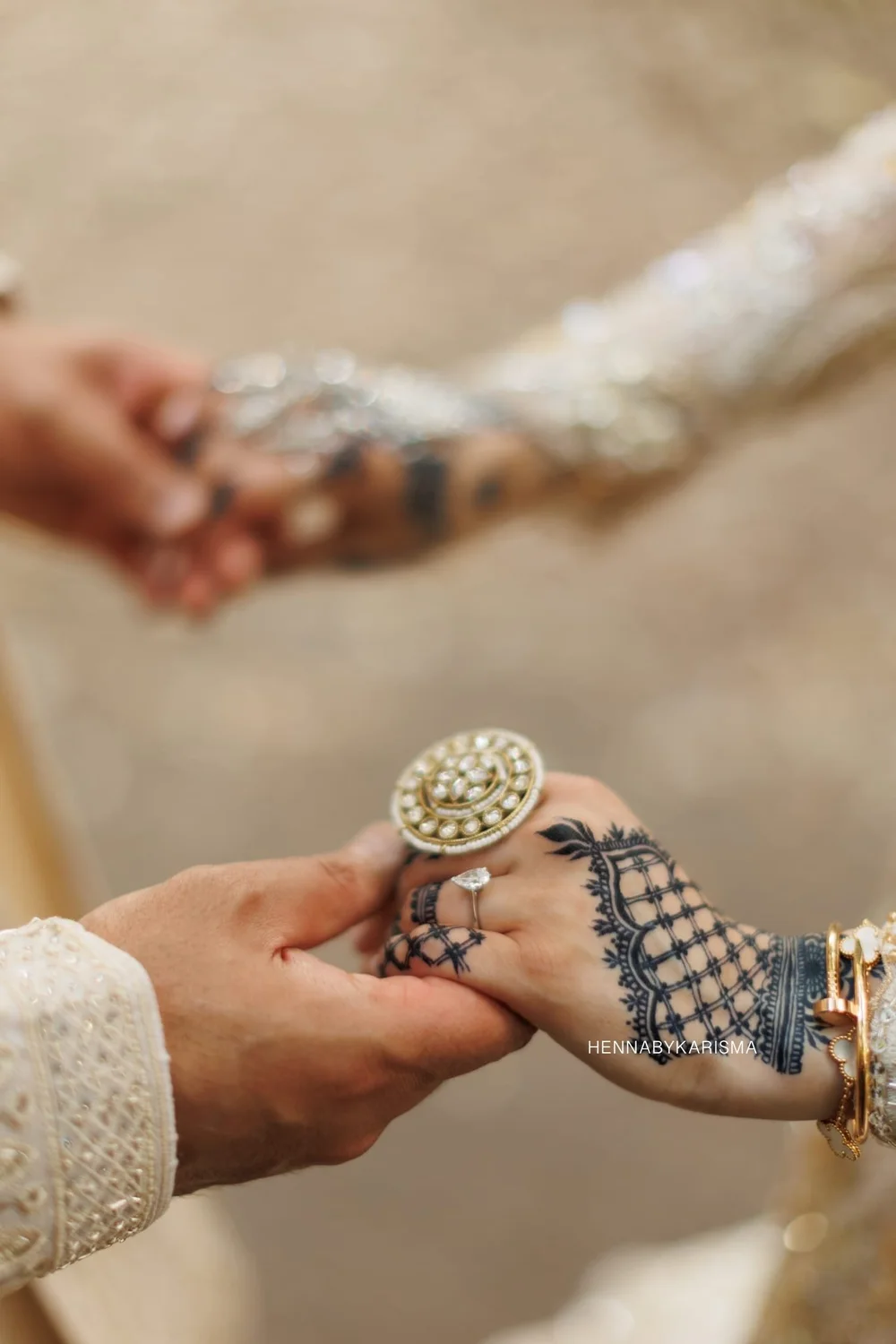 Bride Holding Groom’s Hand – Showcasing Jagua Stains