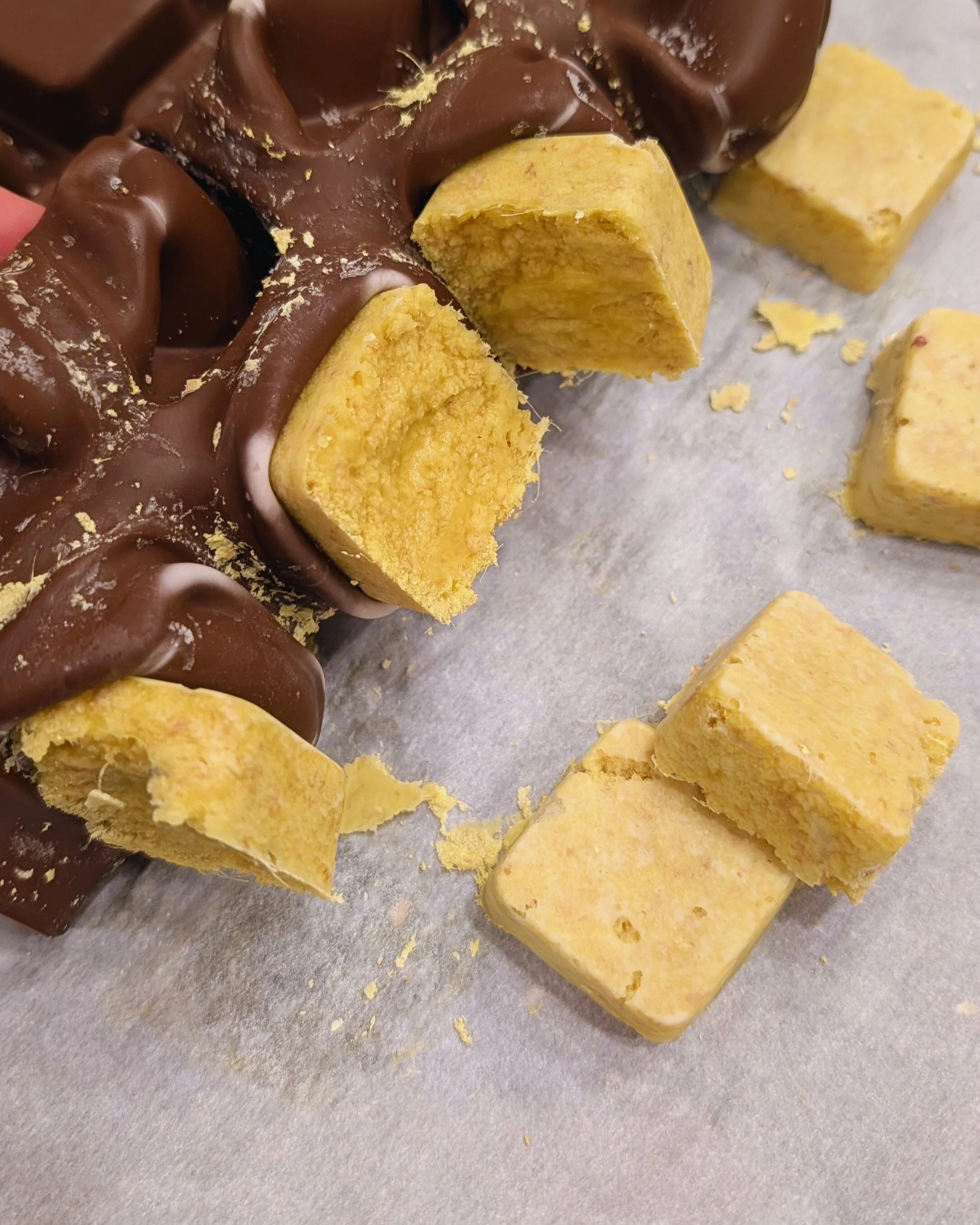 Once frozen solid - overnight will be long enough - remove from the trays