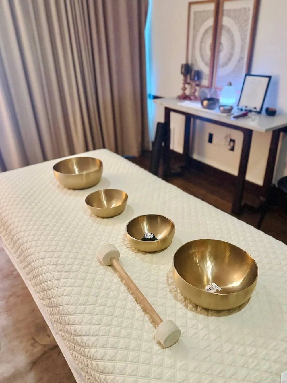 zen bowls on massage table for vibrational sound therapy session