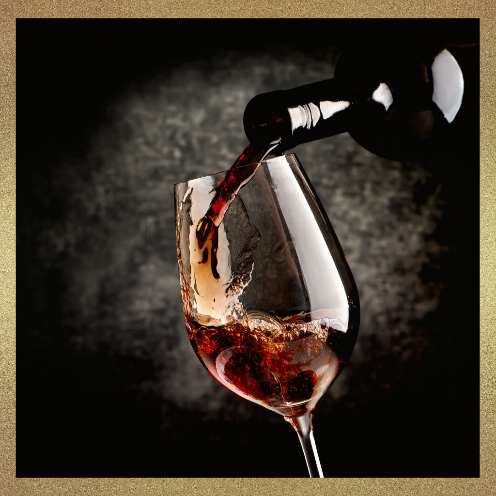 Wine being poured into an elegant glass in soft restaurant lighting, symbolizing refined judgment and quiet executive authority..