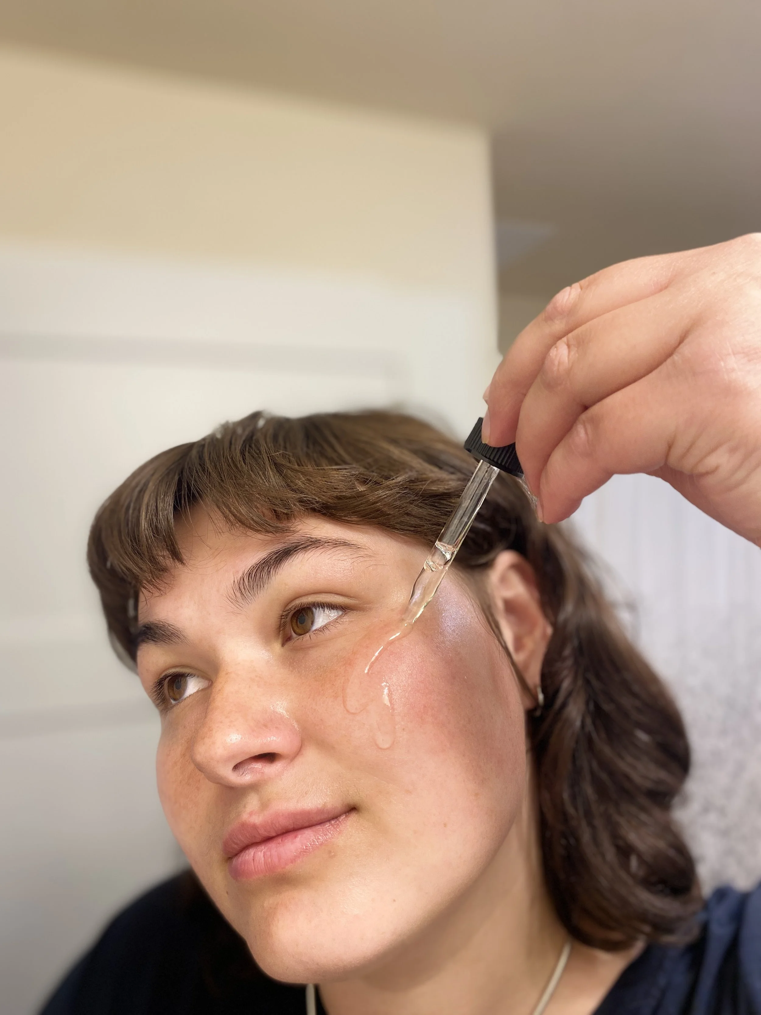 applying face oil.jpg