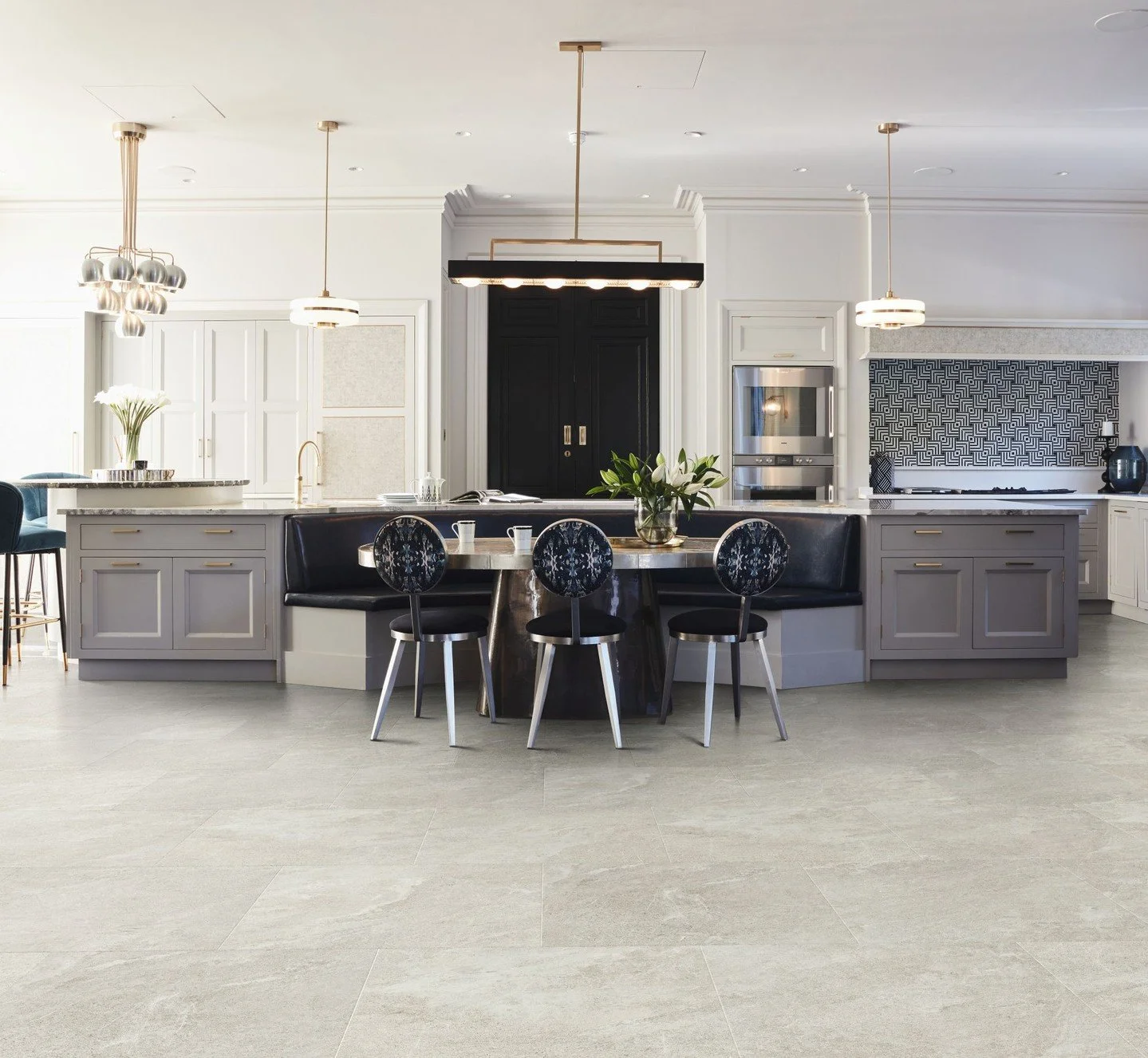 Alpine Quartzite is the lightest of the quartzite-inspired designs in Karndean Designflooring's Art Select collection. Offering a neutral look, the pale grey tones soften the texture of the original stone, a marble-like material sourced from a quarry